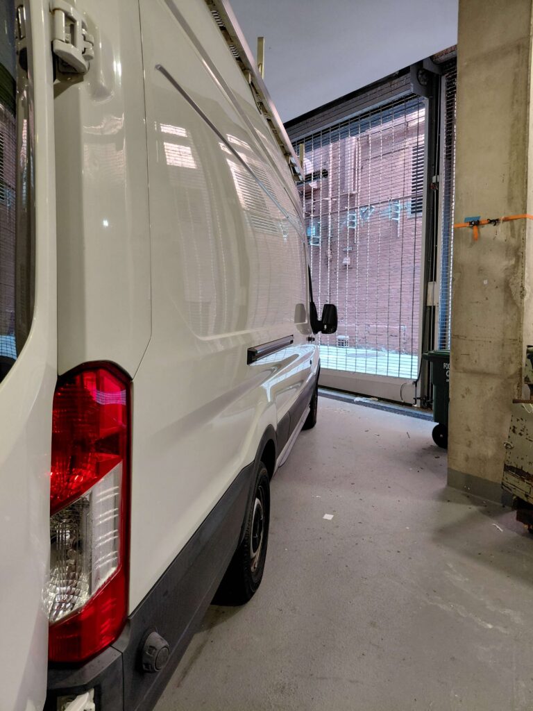 White cargo van providing small moving services in Tacoma