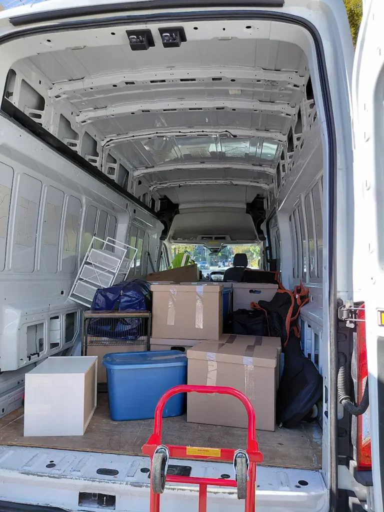 Small load move with furniture and boxes loaded into TYMLI cargo van in Seattle