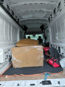 TYMLI small movers transporting furniture and household belongings in West Seattle.