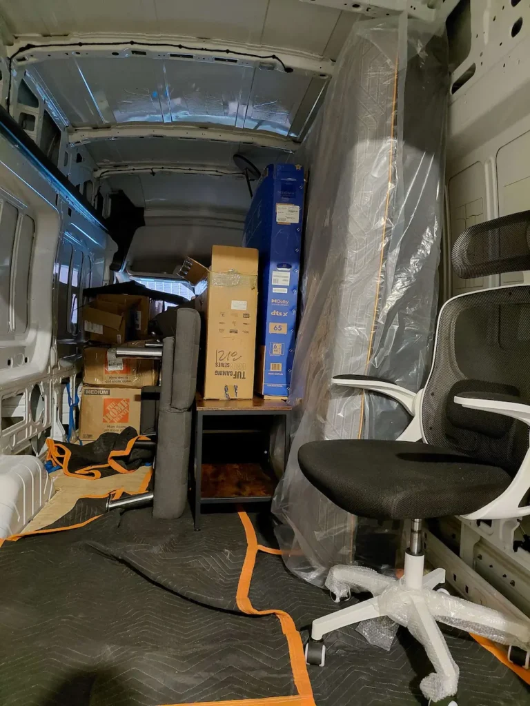 TYMLI van loaded with furniture and boxes for a small move in Seattle.